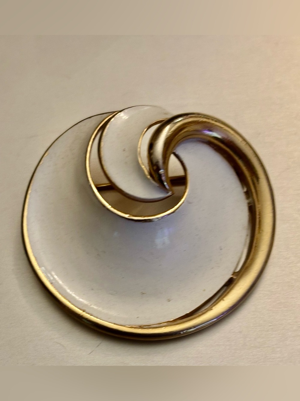 Trifari White and Gold Swirl Enamel Brooch